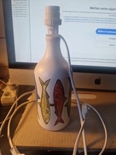 bouteille d'huile montée en