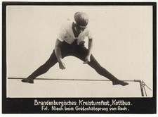 Original vintage 1930s German athlete jumping from the reck