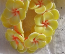LOT DE 4 PERLES FLEURS