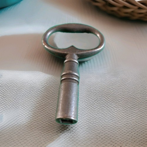 Clé horloge pendule - d',