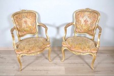 Paire de fauteuils dorés style Louis XV