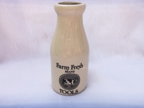 Older ceramic milk bottle - milk,