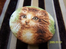 Beautiful fabric button depicting a cat's head.  50mm diameter. Ref No. 671