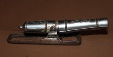 Ancienne figurine canon ouvre