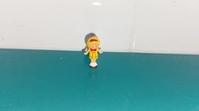 Polly pocket figurine doll