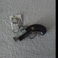 Ancien jouet arme miniature