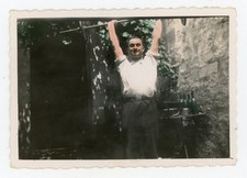 PHOTO colorized snapshot, men muscle hanging from a bar sports shirt