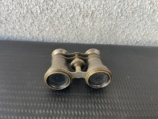 Jumelles de théâtre anciennes en laiton gravé