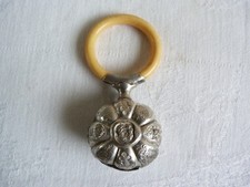 Hochet grelot forme rosace en