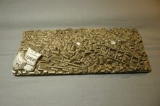 G, Plaque de pavés et sacs de