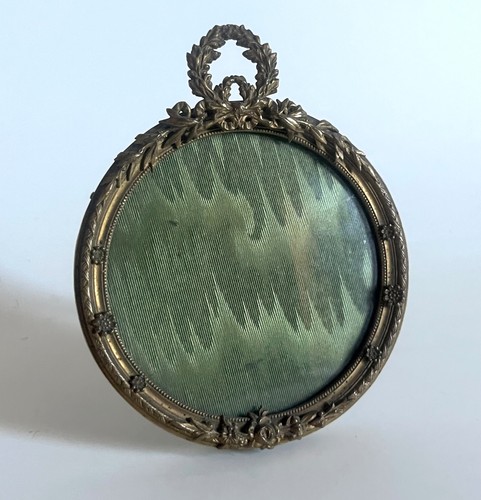 Petit cadre rond bronze - en,