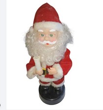 Pere noel musical lumineux - Costume rouge et fourrure blanche - Haut 33 cm