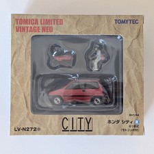 Honda City R (rouge) avec