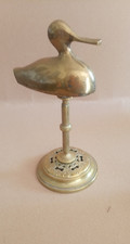 canard en laiton sur support