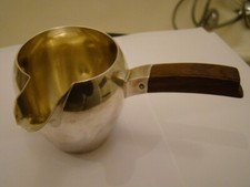  Petit pot à lait en argent  , poids brut 100 Grs   #566#