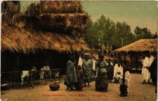 Old postcard AK PARIS EXPO Porte Maillot Village Senegalais La Cuisine (569696)