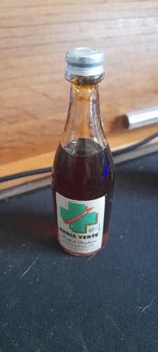 Bouteille huile croix verte