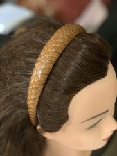 Serre Tête Serpent Marque