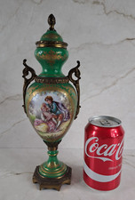 small porcelain urn bronze or brass frame antique medallion urn vase