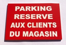panneau "PARKING RESERVE AUX
