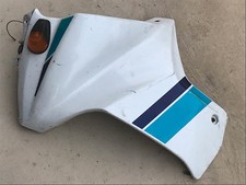 UN CARENAGE FLAN GAUCHE CACHE