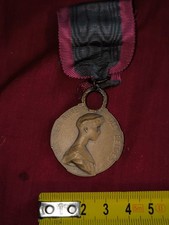 médaille de la REINE