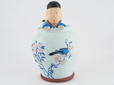Statuette Tintin et Milou dans potiche Lotus bleu en plâtre hauteur de 26 cm