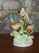 Groupe d'oiseaux en porcelaine