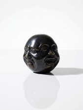 Tête de Bouddha à quatre