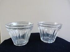 Deux anciens pots coniques à