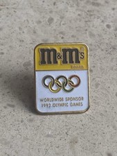 Pin’s M&M’s Olympic Sponsor 1992 Cojo +