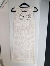 Lovely Odd Molly cream crochet dress in size 2 with pretty pink ties at back.