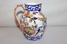 Ancien crémier en faïence de