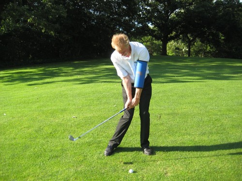 Golf bending your arm get - -,
