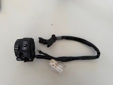 UN COMMODO COMMANDE GAUCHE