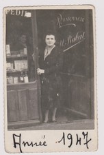 old photo ?️ woman in front of pharmacy M. Rabat 1947 showcase