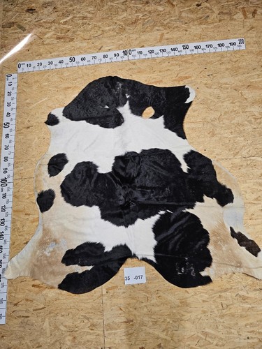 Peau vache avec petits - de,