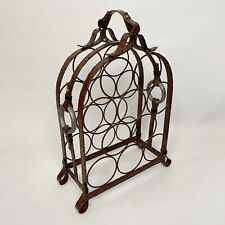 Casier a bouteilles Fer forgé trompe l oeil cuir piqué sellier adnet ryckaert 