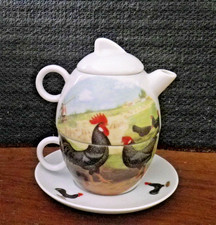 Petite theière sur tasse avec sous tasse décor coq et poules Djem Hollande