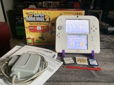 2DS New Super Mario 2 blanc & rouge en boite + chargeur+ 2jeux (1* DS & 1* 3DS)