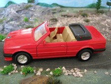 1:43 scale Diecast model BMW 325i Cabriolet E30 in red opening doors
