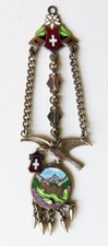 Pendentif bijou Chatelaine en métal et émail SUISSE aigle mouflon edelweiss