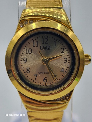Montre femme dorée quartz - qq,