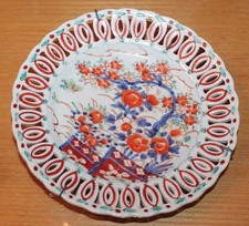 antique openwork plate with Asian decor 