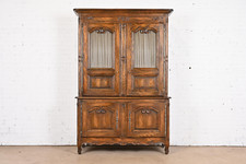 Baker Furniture French Provincial Louis XV Carved Oak Lighted Bar Cabinet, 1960s