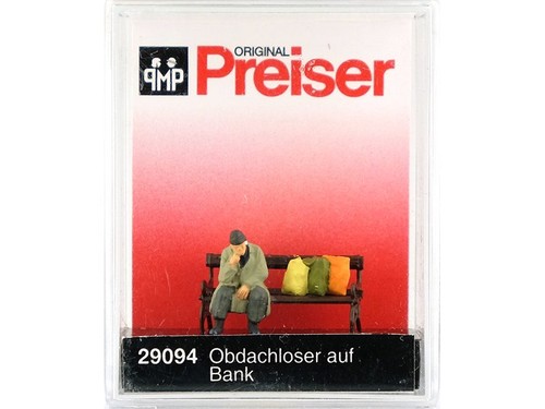 Preiser sans abri assis sur - preiser,