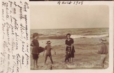Old postcard photograph 1908 family and their dog at the beach nice scene