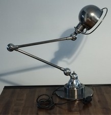 Lampe Jieldé à 2 bras, restaurée et vissée sur disque de frein neuf.