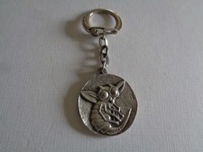 ANCIEN PORTE CLE METAL FLY TOX