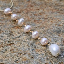 1 boucle d'oreille perles de